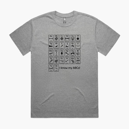 Grey oversized t-shirt with a print of an automotive-themed alphabet chart with car parts for each letter.