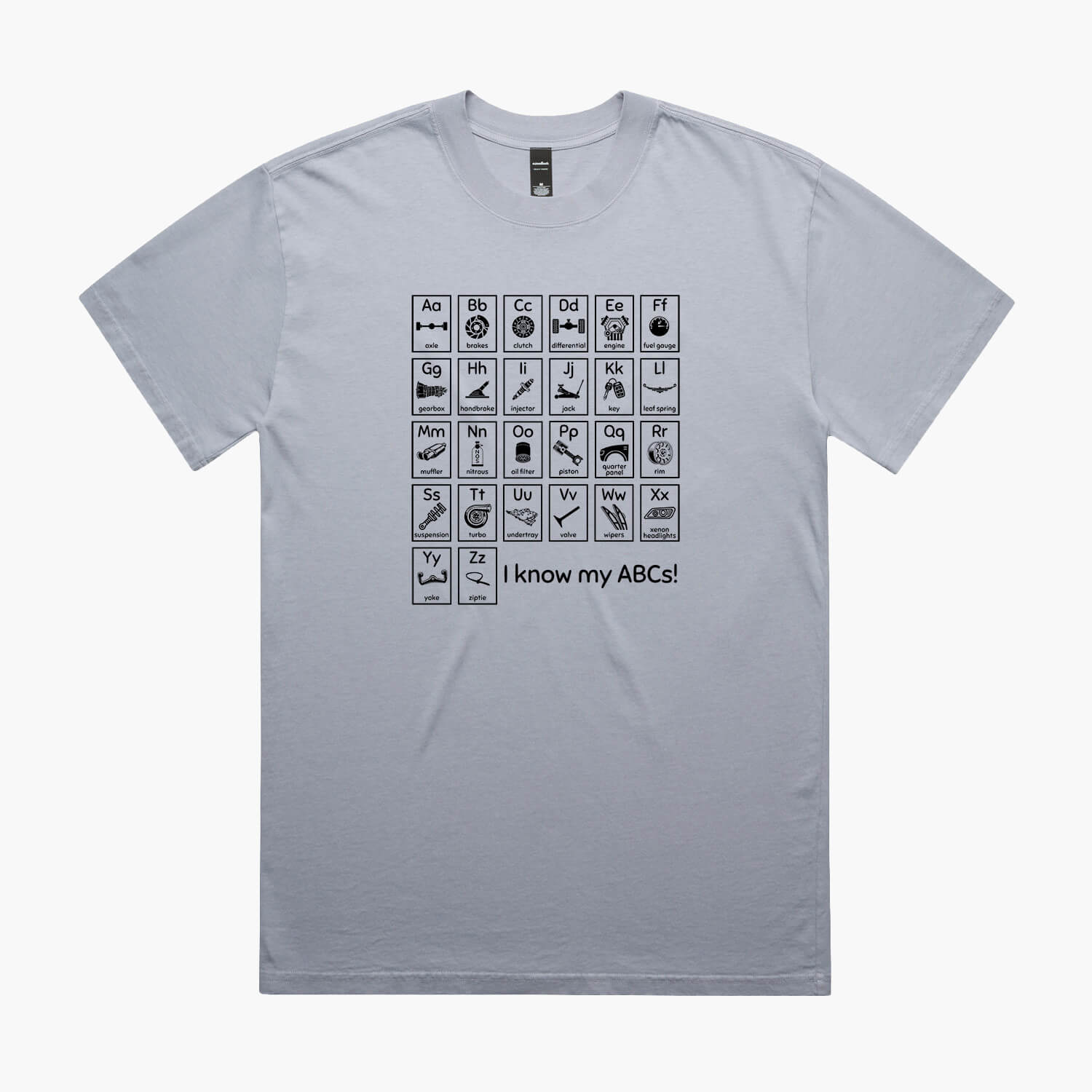 Powder oversized t-shirt with a print of an automotive-themed alphabet chart with car parts for each letter.