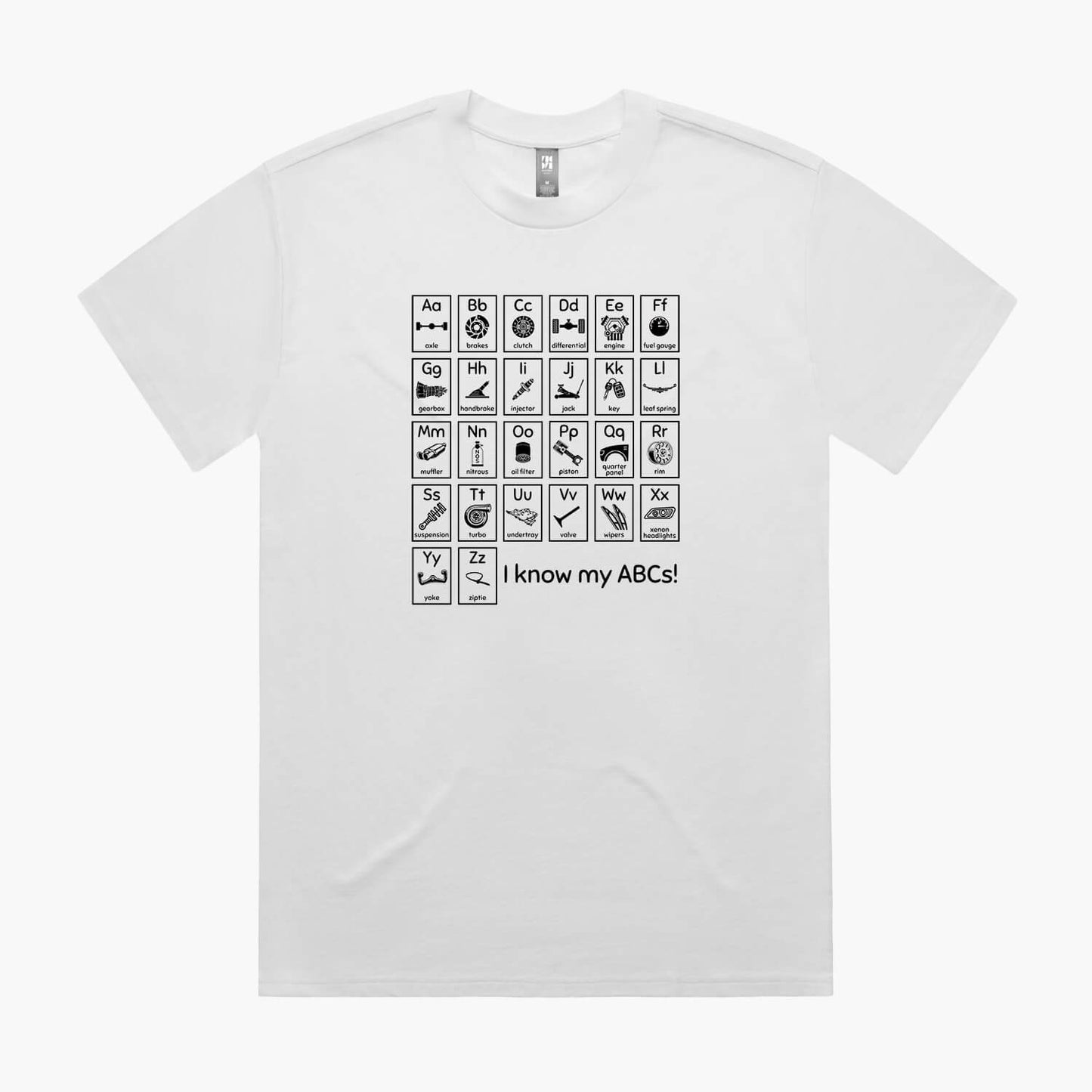 White oversized t-shirt with a print of an automotive-themed alphabet chart with car parts for each letter.