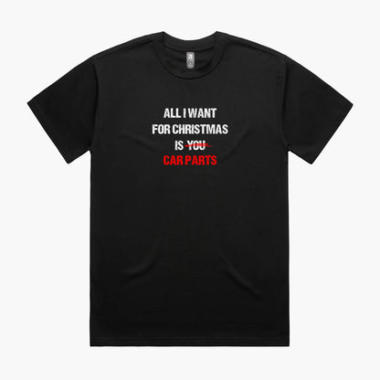 Black oversized t-shirt with the slogan "All I Want for Christmas is Car Parts" printed on the front in white and red.