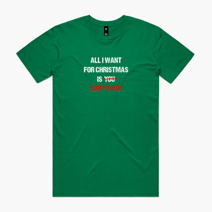 Green t-shirt with the slogan "All I Want for Christmas is Car Parts" printed on the front in white and red.